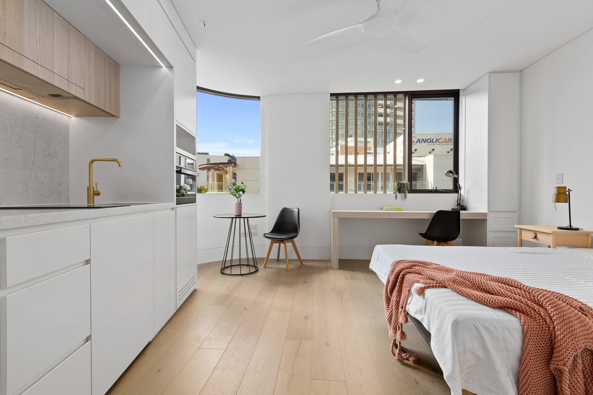 Contemporary Australian apartment featuring minimalist timber skirting boards and clean-lined architraves enhancing architectural detailing.