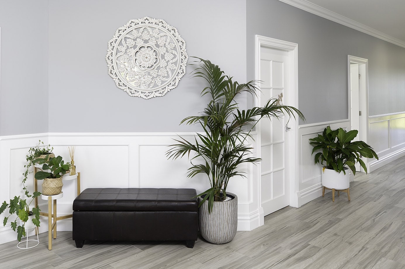 Hamptons style hallway with Intrim SK460 wainscoting, soft grey walls and light timber floors for a classic coastal interior look