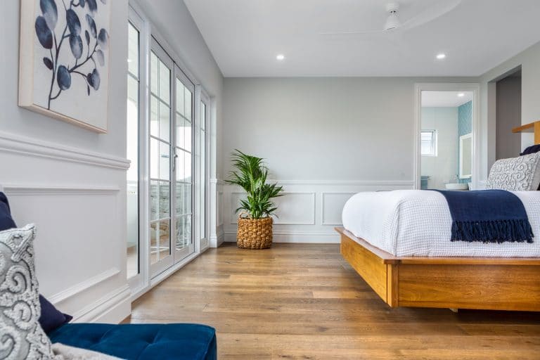Classic Hamptons bedroom featuring SK945B skirting board profile with decorative wall panelling and refined architectural detailing
