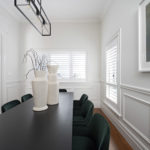 Modern Hamptons dining room featuring SK433 skirting and architrave profile with classic wall panelling and crisp architectural detailing