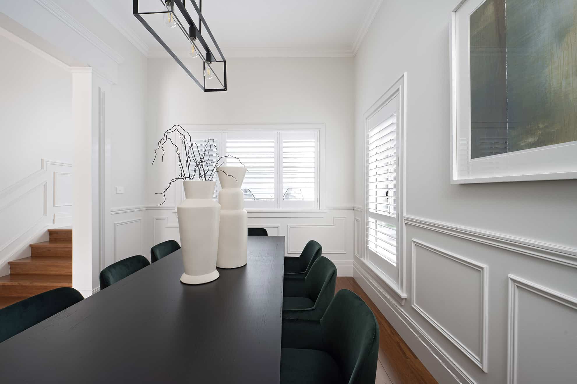 Modern Hamptons dining room featuring SK433 skirting and architrave profile with classic wall panelling and crisp architectural detailing