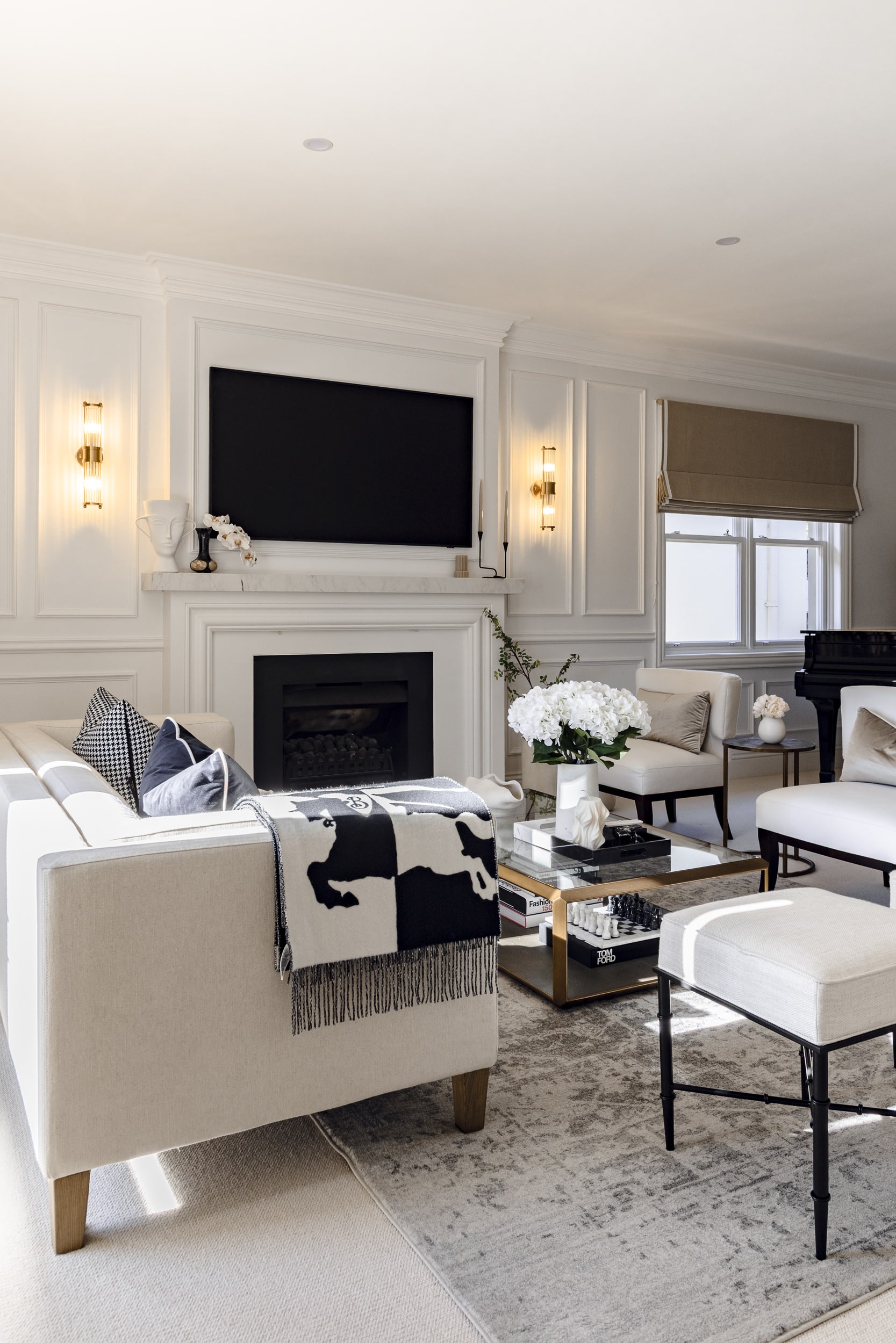 Stylish living space designed with decorative wainscoting to add detail and reinforce an American classic interior style.