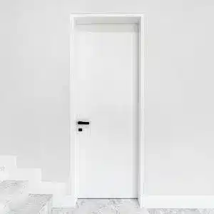 Timber door jamb moulding installed in a modern interior doorway with clean architectural lines