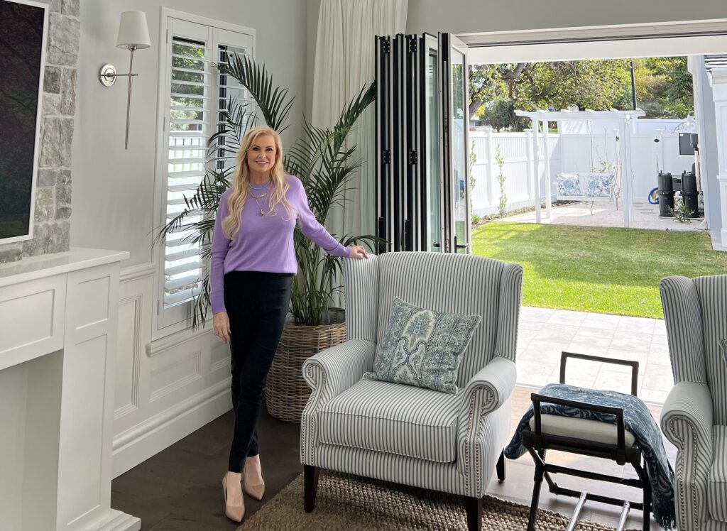 Natalee Bowen, founder of Indah Island, in a Hamptons-style interior