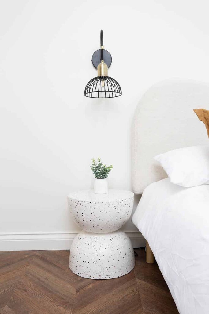 Contemporary bedroom featuring the Intrim SK445 skirting board profile, adding clean architectural lines and a refined finish to a minimalist interior.