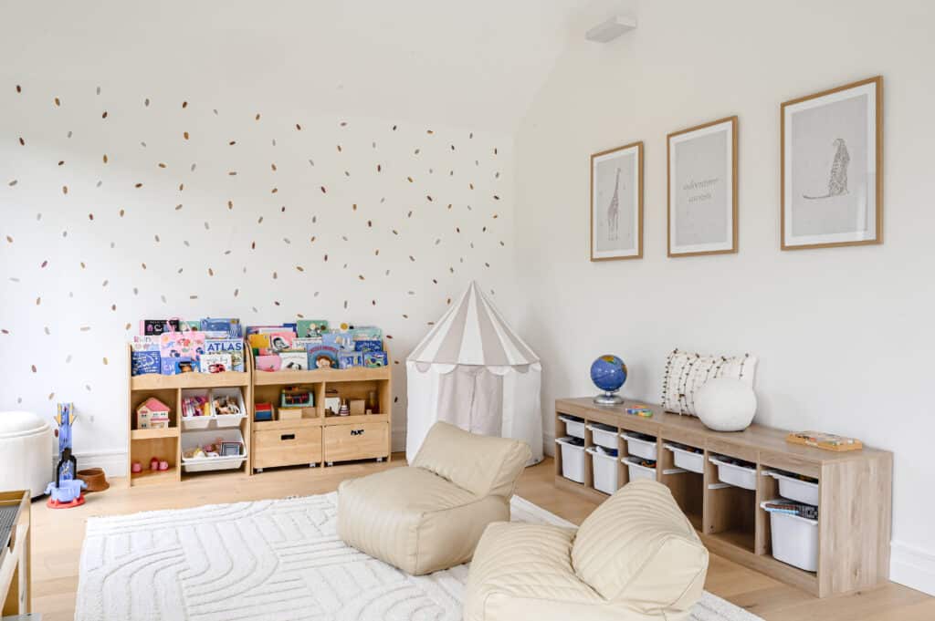 Contemporary farmhouse children's playroom with timber storage units, soft furnishings and Intrim SK1474 skirting.