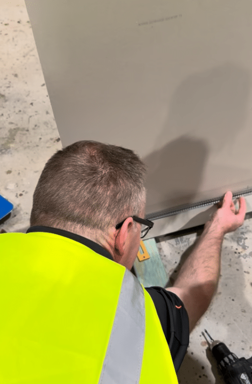 Installation of P50 shadowline skirting detail.