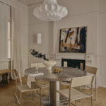 Dining room with fireplace and wall panelling in Potts Point terrace renovation by Convict Interiors using Intrim mouldings