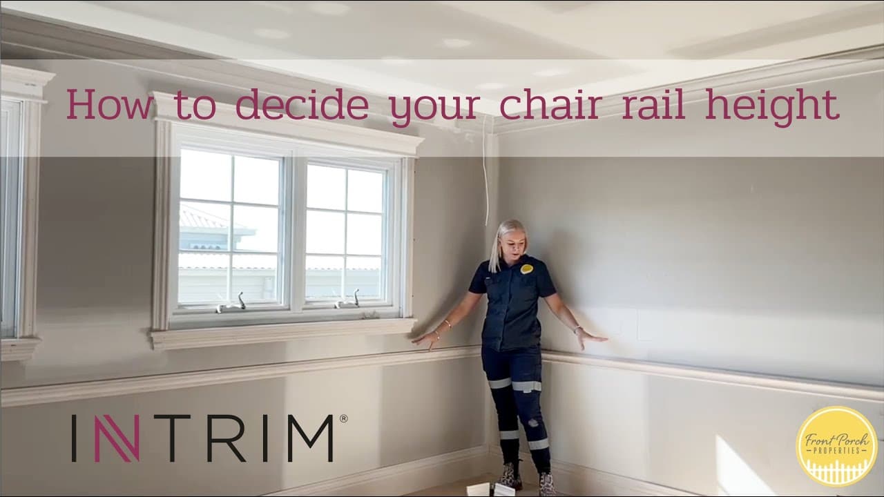 Rachael Turner installing an Intrim chair rail in a Cape Cod home theatre room.